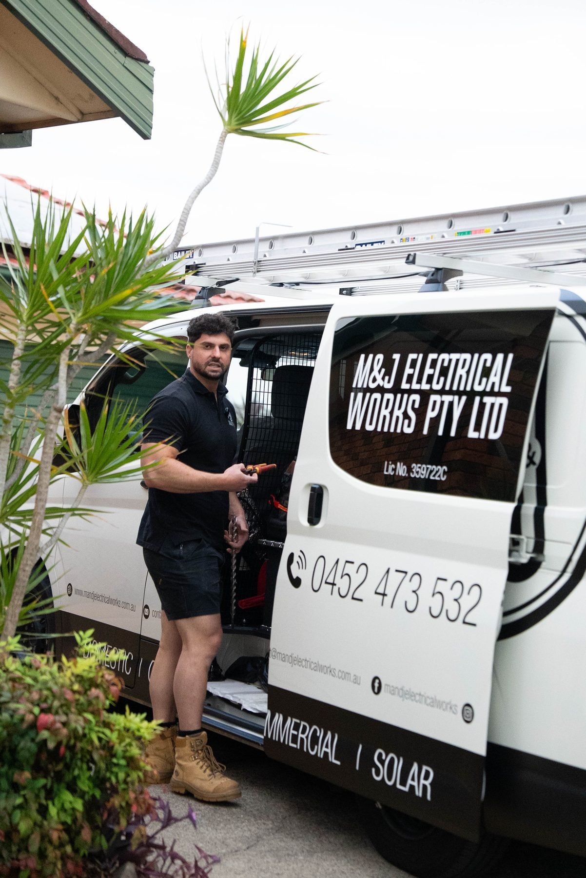 M and J Electrical Works van parked at a residential job in South-Western Sydney
